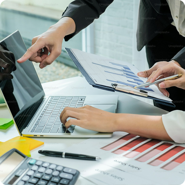 Professionals reviewing business data